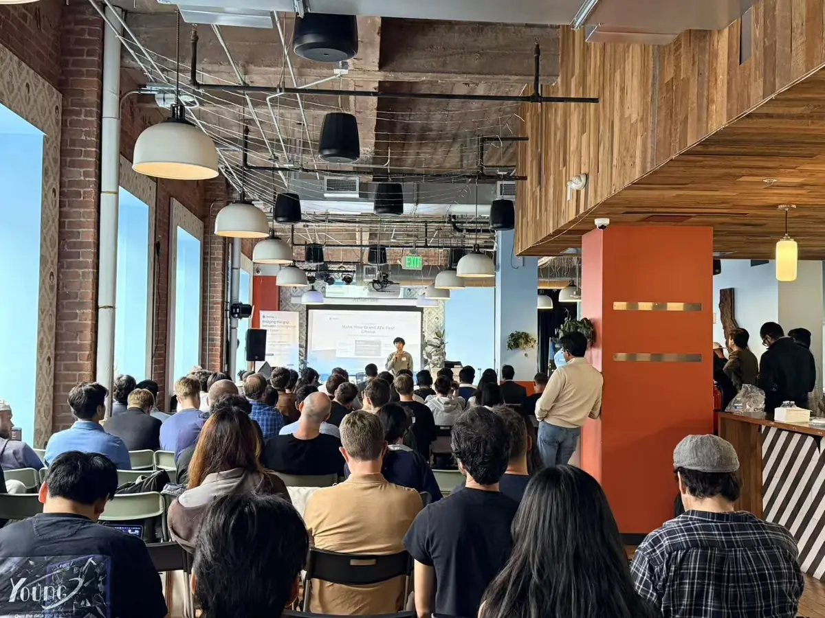 A founder presenting to a seated room
